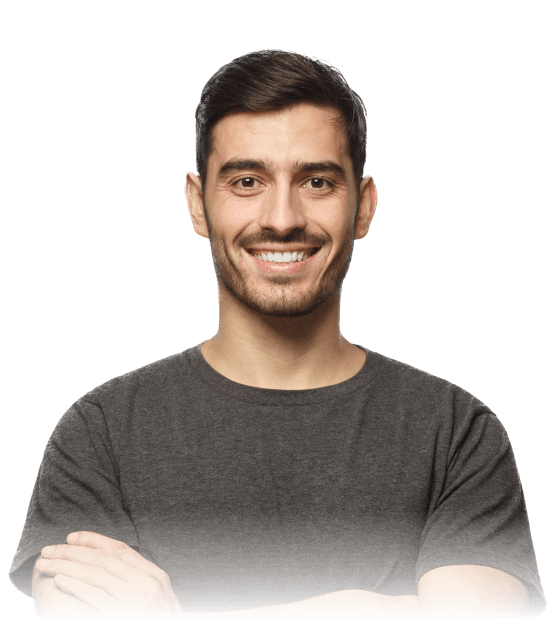 Portrait-of-smiling-handsome-man-in-grey-t-shirt-standing-with-crossed-arms-on-gray-backgrounds
